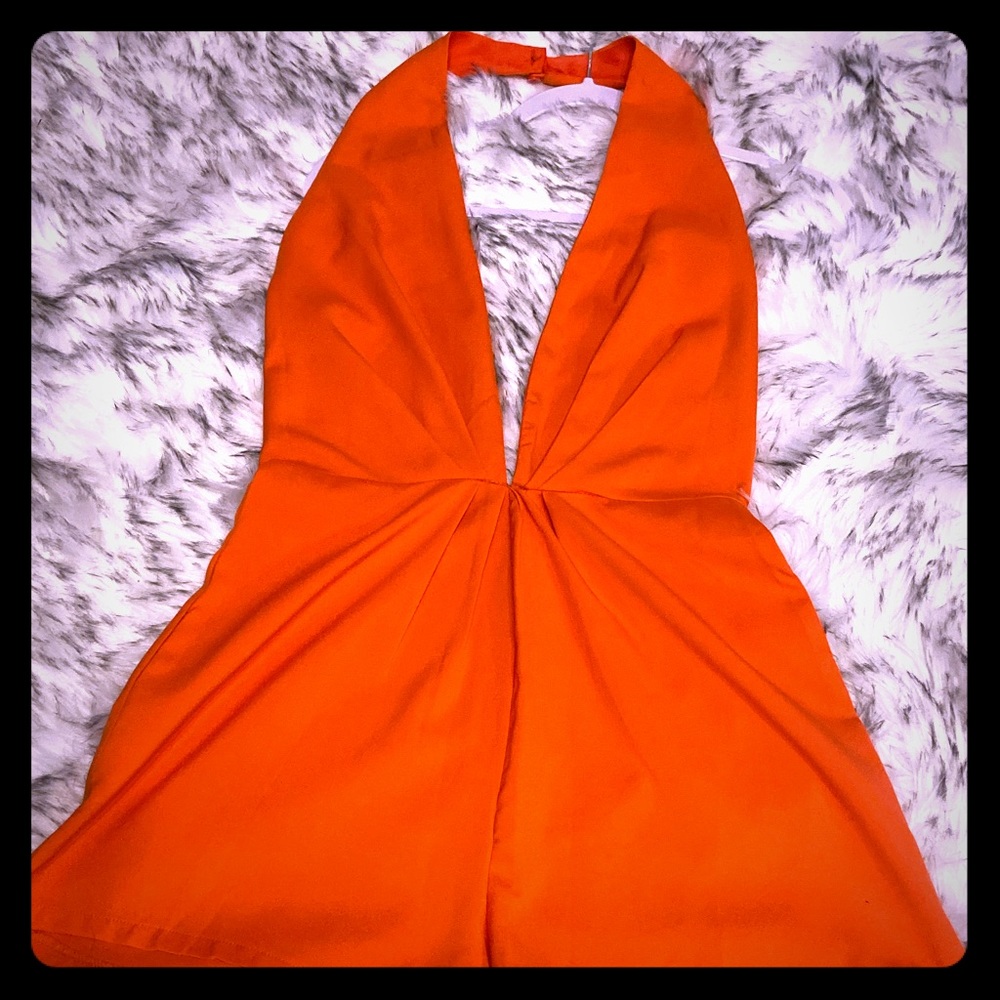GORGEOUS! Orange romper with fully open back!